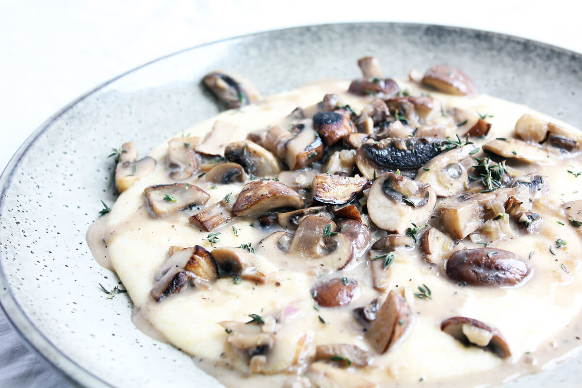 Creamy Vegan Polenta with Mushroom Ragù