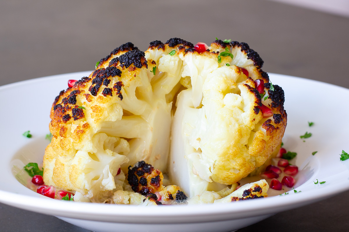 Whole Roasted Cauliflower with Pomegranate Tahini Sauce