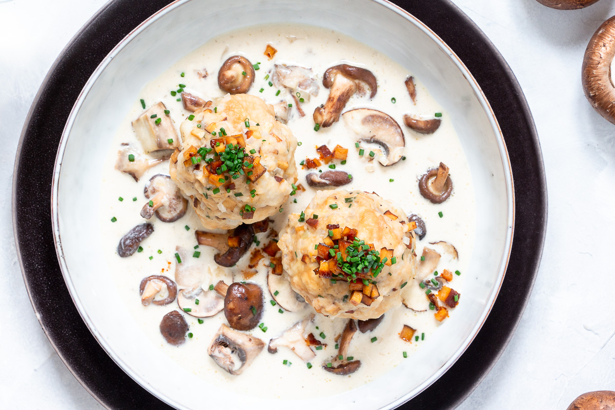 Vegan Tyrolean Bacon Dumplings with Mushroom Cream Sauce