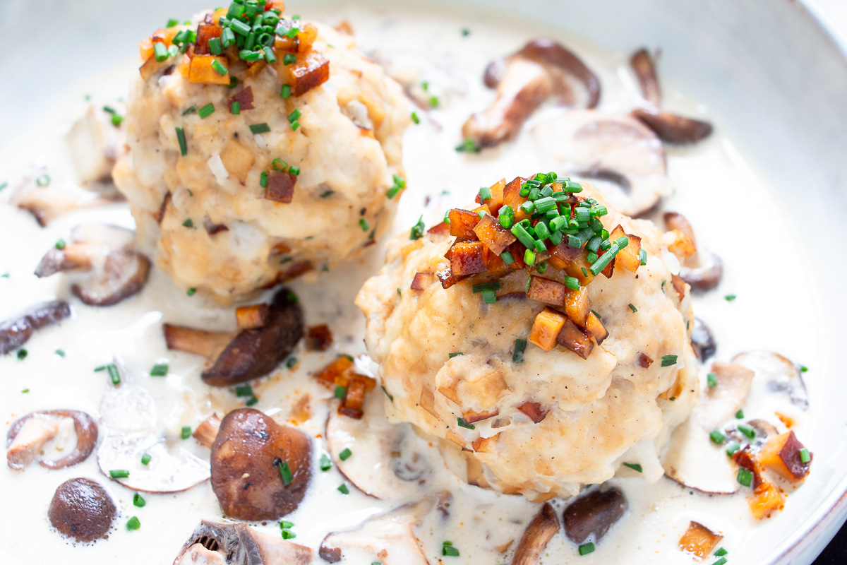 Vegan Tyrolean Bacon Dumplings with Mushroom Cream Sauce