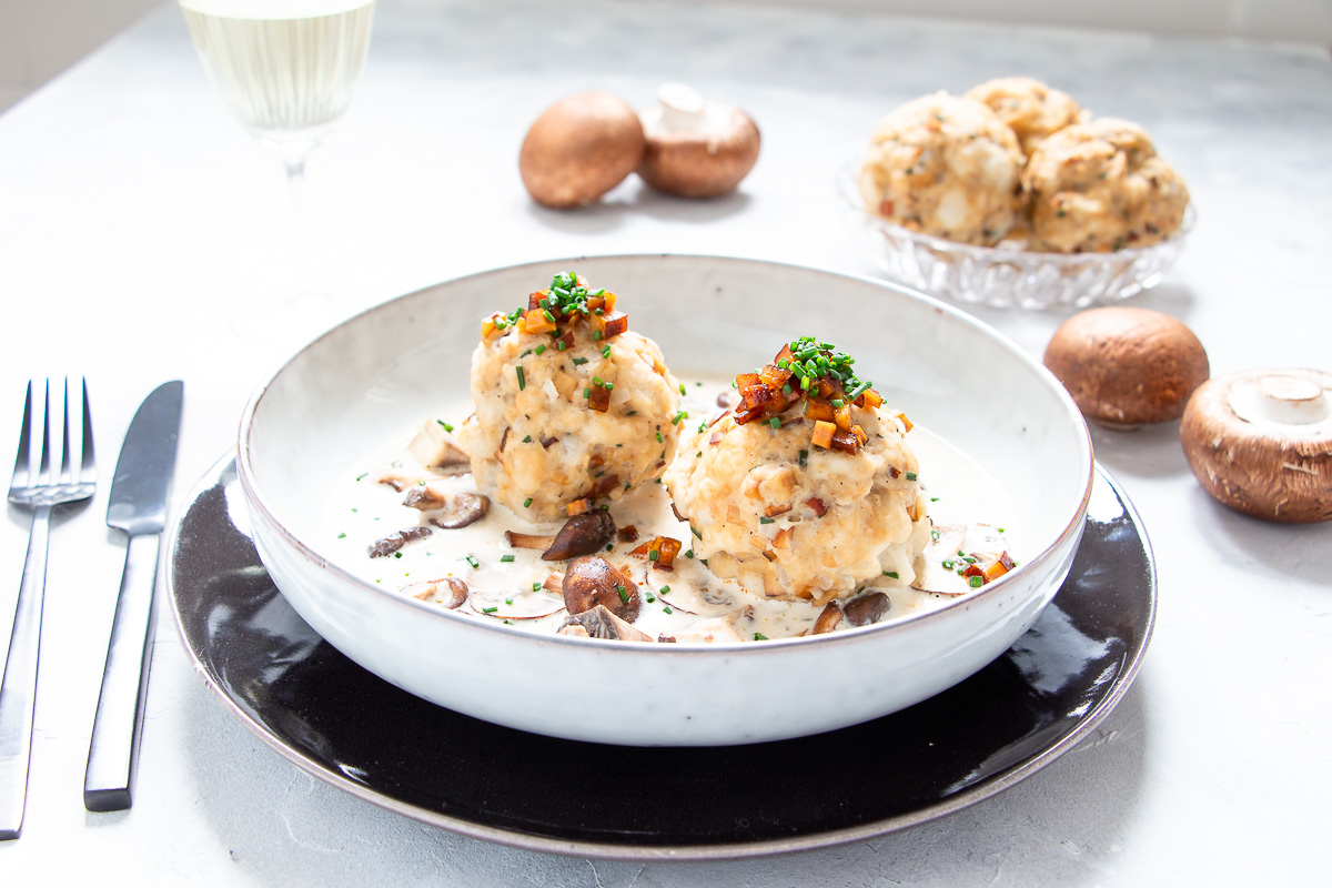 Vegan Tyrolean Bacon Dumplings with Mushroom Cream Sauce